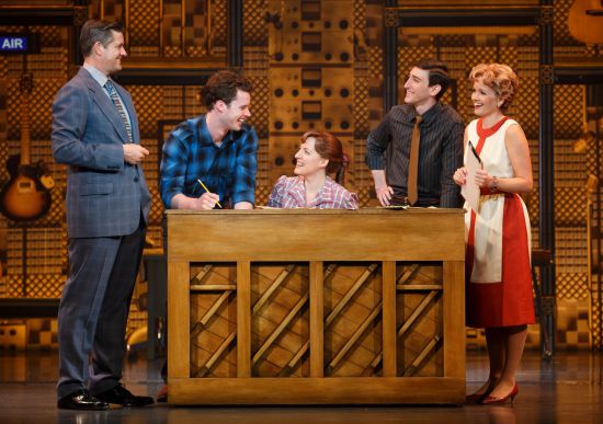 Curt Bouril (“Don Kirshner”), Liam Tobin (“Gerry Goffin”), Abby Mueller (“Carole King”), Ben Fankhauser (“Barry Mann”) and Becky Gulsvig (“Cynthia Weil”). Beautiful: The Carole King Musical. Photo by Joan Marcus